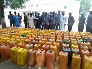 Seized Jerrycans of PMS display by Comptroller of Customs Kebbi State Area Command Mr Iheanacho Ernest Ojike at the Customs headquarters Birnin Kebbi.